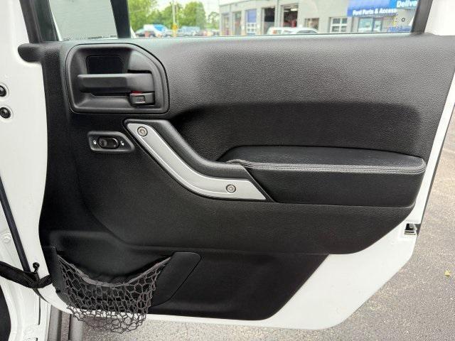 used 2015 Jeep Wrangler Unlimited car, priced at $21,937
