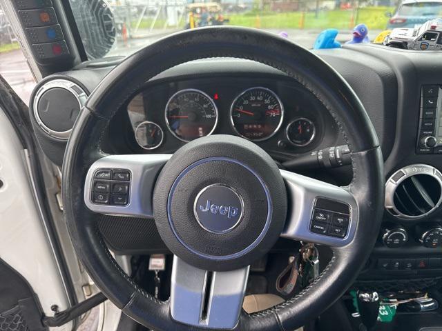 used 2015 Jeep Wrangler Unlimited car, priced at $21,843