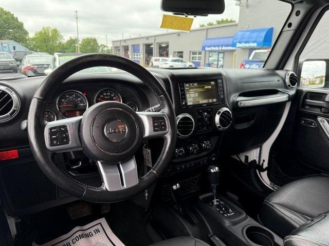 used 2015 Jeep Wrangler Unlimited car, priced at $21,937
