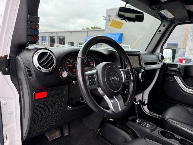 used 2015 Jeep Wrangler Unlimited car, priced at $21,937