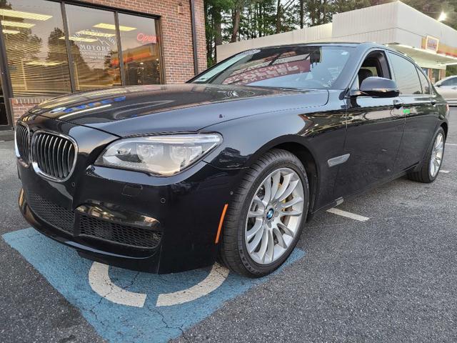 used 2015 BMW 740 car, priced at $16,950