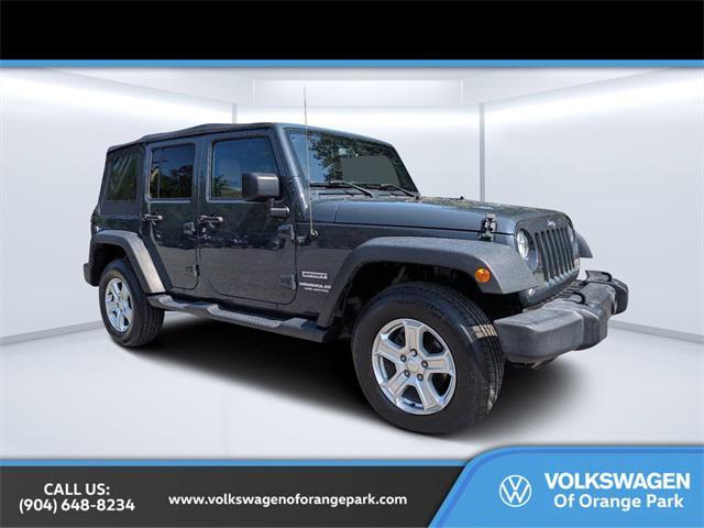 used 2017 Jeep Wrangler Unlimited car, priced at $23,526