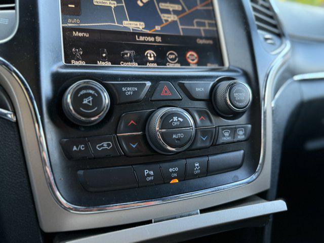 used 2014 Jeep Grand Cherokee car, priced at $12,986