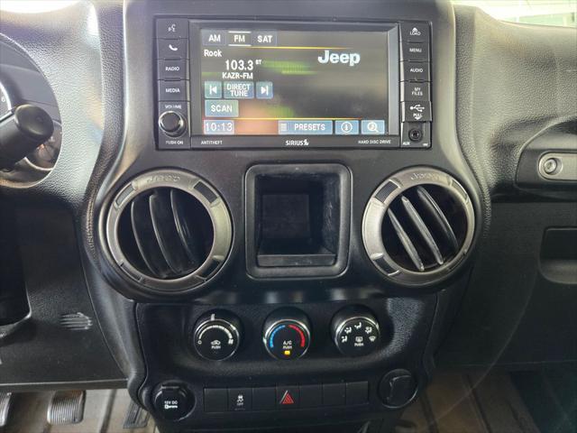 used 2015 Jeep Wrangler Unlimited car, priced at $9,990