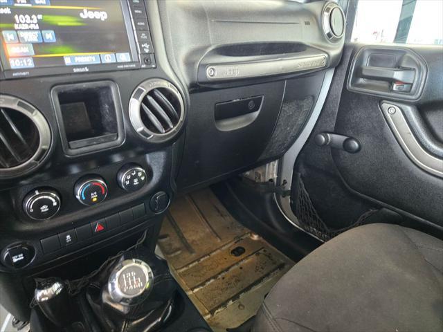 used 2015 Jeep Wrangler Unlimited car, priced at $9,990