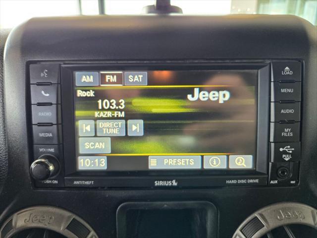 used 2015 Jeep Wrangler Unlimited car, priced at $9,990