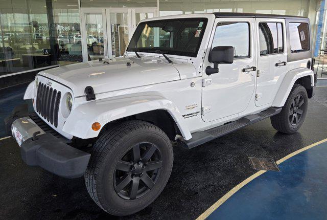 used 2013 Jeep Wrangler Unlimited car, priced at $15,990