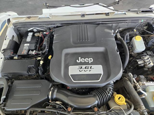 used 2013 Jeep Wrangler Unlimited car, priced at $15,990