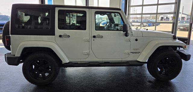 used 2013 Jeep Wrangler Unlimited car, priced at $15,990