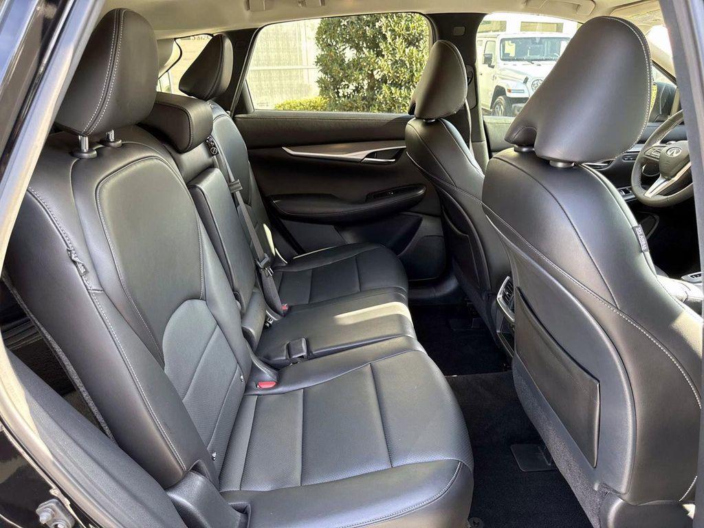 used 2023 INFINITI QX50 car, priced at $29,870