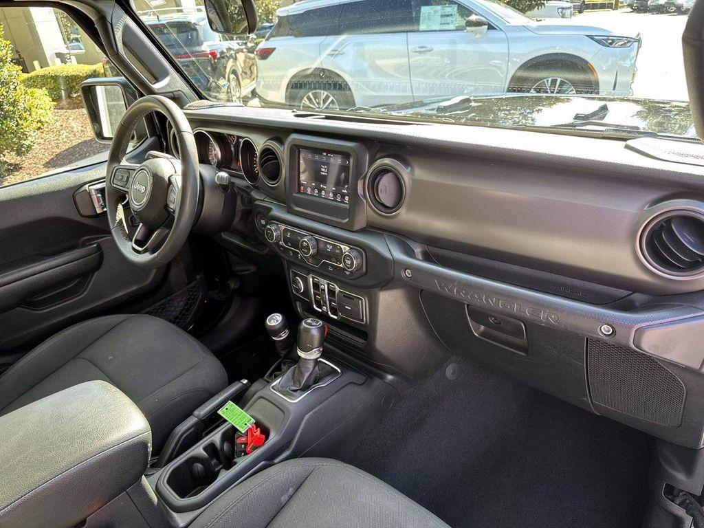 used 2023 Jeep Wrangler car, priced at $27,555