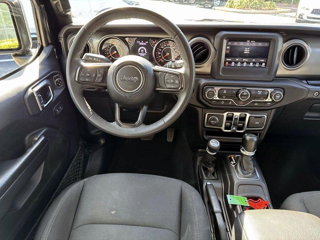 used 2023 Jeep Wrangler car, priced at $27,555