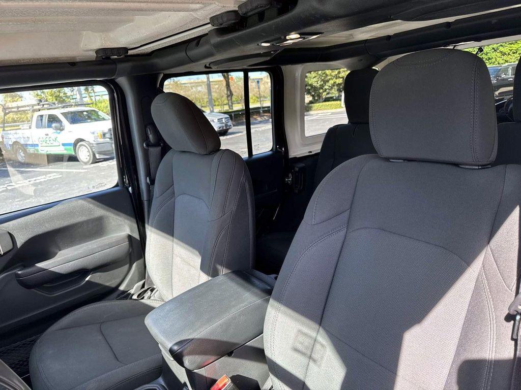 used 2023 Jeep Wrangler car, priced at $27,555