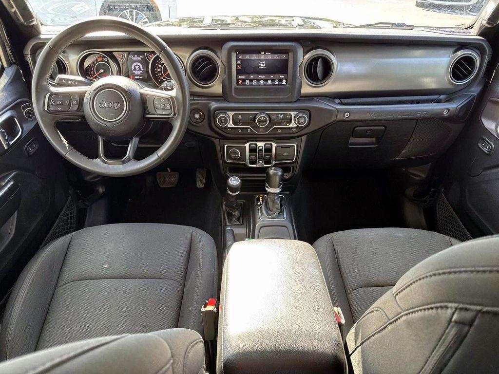 used 2023 Jeep Wrangler car, priced at $27,555