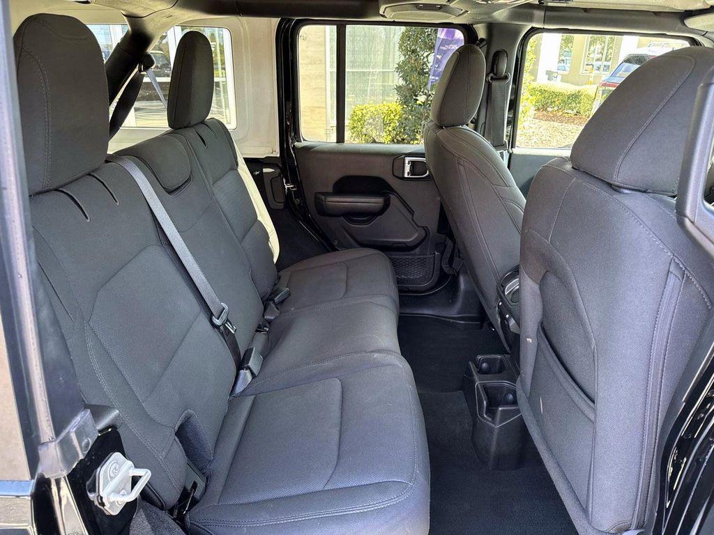 used 2023 Jeep Wrangler car, priced at $27,555