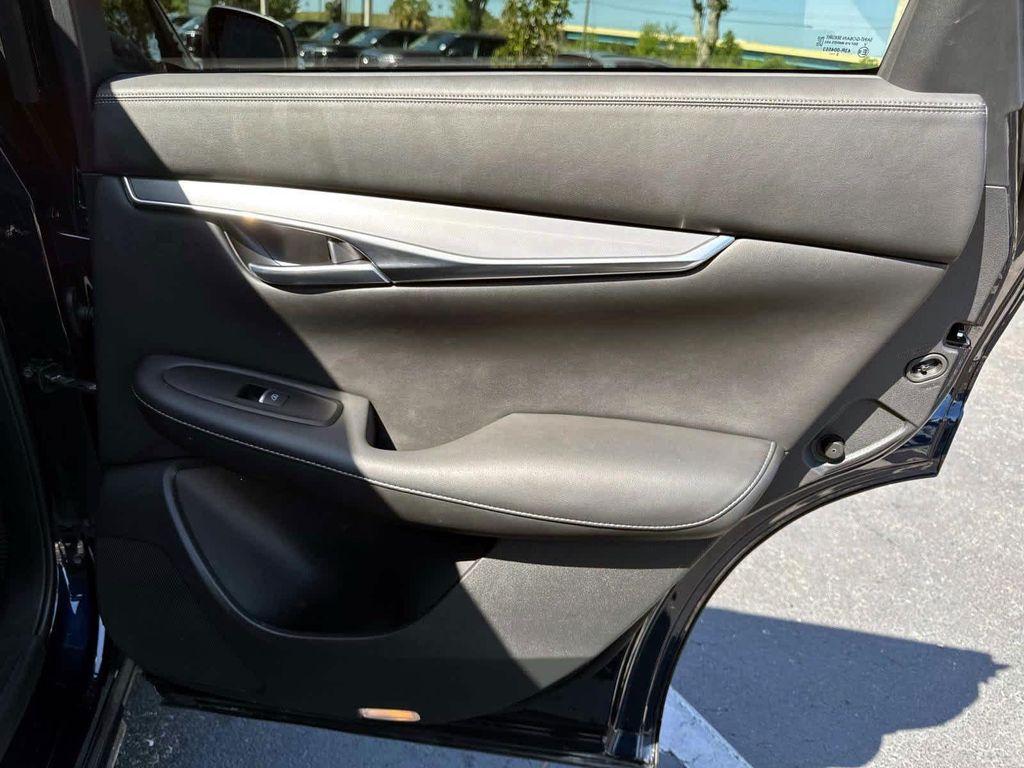 used 2024 INFINITI QX50 car, priced at $32,900