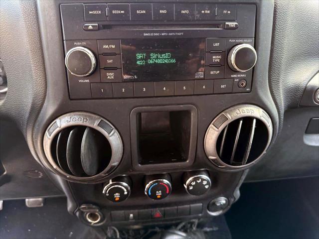 used 2015 Jeep Wrangler car, priced at $14,555