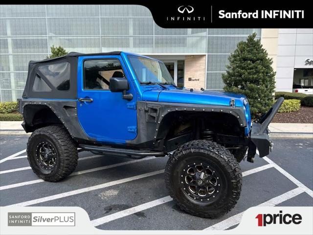 used 2015 Jeep Wrangler car, priced at $14,555