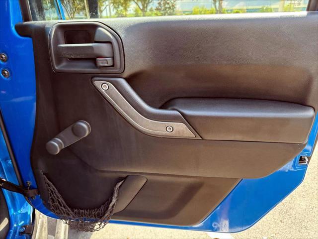 used 2015 Jeep Wrangler car, priced at $14,555