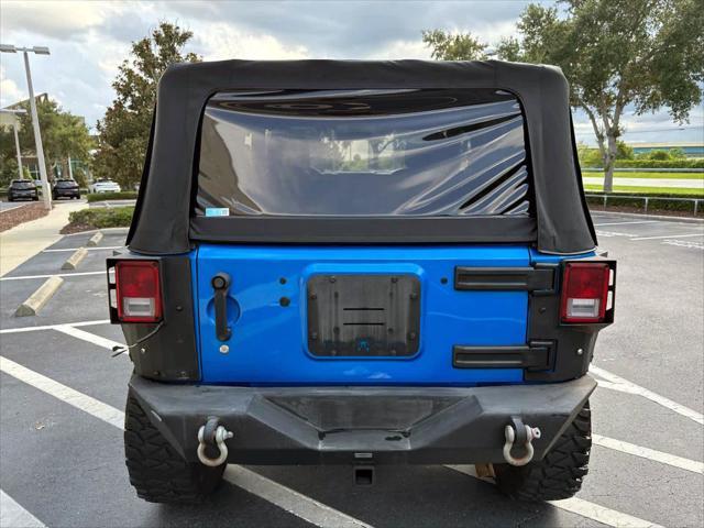 used 2015 Jeep Wrangler car, priced at $14,555