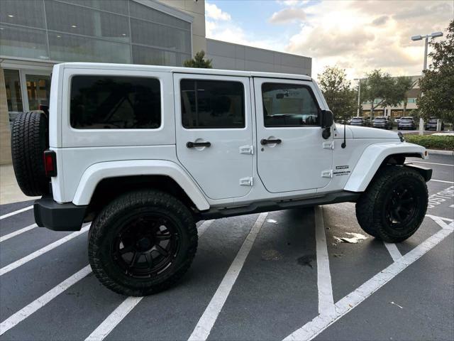 used 2015 Jeep Wrangler Unlimited car, priced at $18,888
