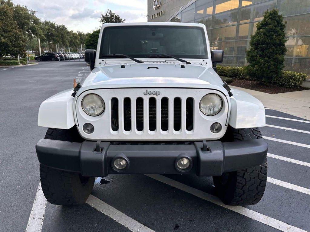used 2015 Jeep Wrangler Unlimited car, priced at $16,880