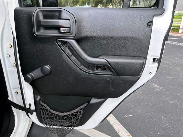 used 2015 Jeep Wrangler Unlimited car, priced at $18,888