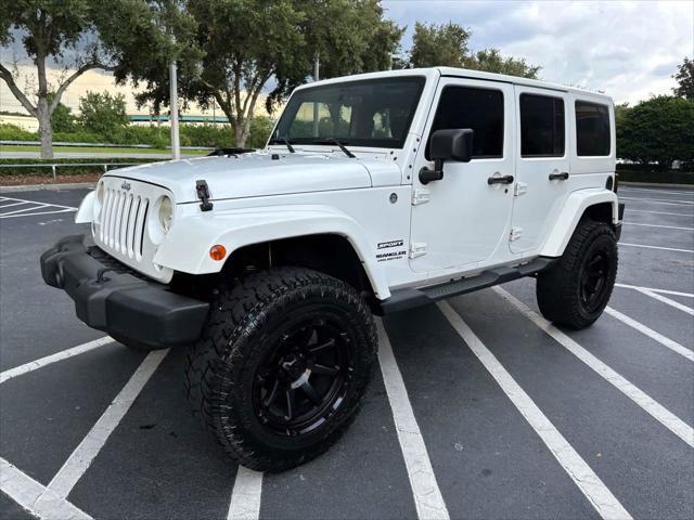 used 2015 Jeep Wrangler Unlimited car, priced at $18,888