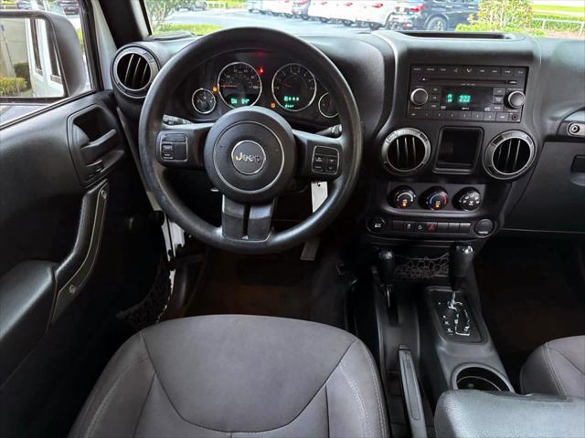 used 2015 Jeep Wrangler Unlimited car, priced at $18,888