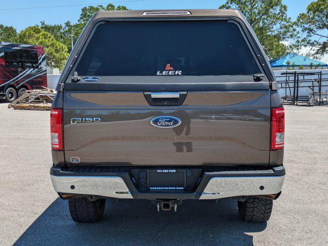 used 2015 Ford F-150 car, priced at $14,000