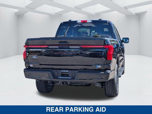 new 2025 Ford F-150 Lightning car, priced at $77,590