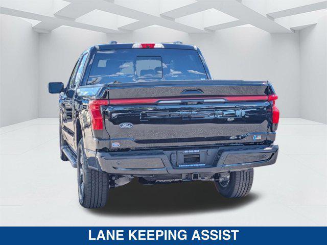 new 2025 Ford F-150 Lightning car, priced at $77,590