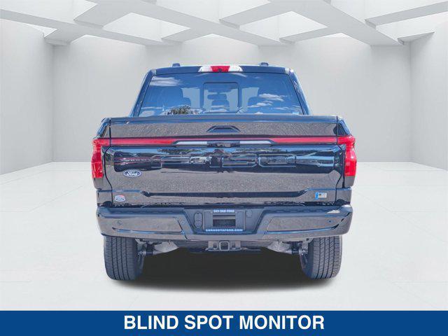 new 2025 Ford F-150 Lightning car, priced at $77,590