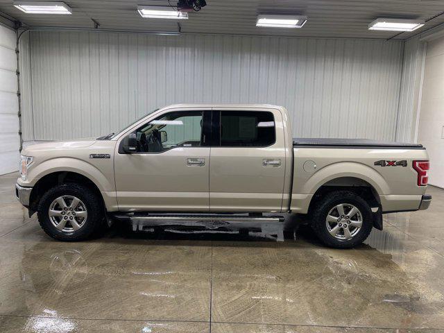used 2018 Ford F-150 car, priced at $29,214