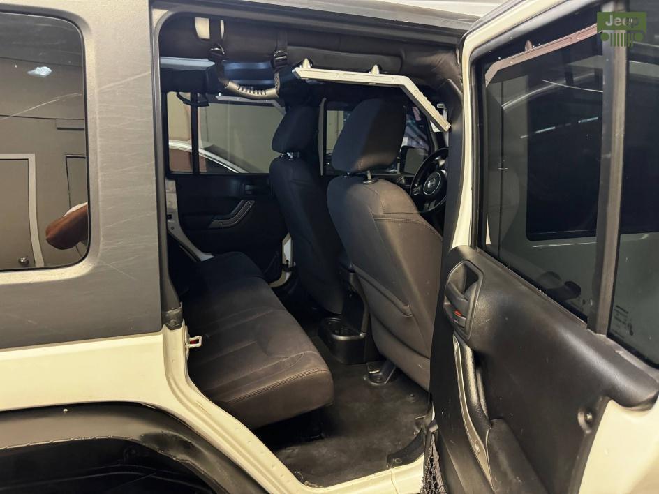 used 2014 Jeep Wrangler Unlimited car, priced at $13,850
