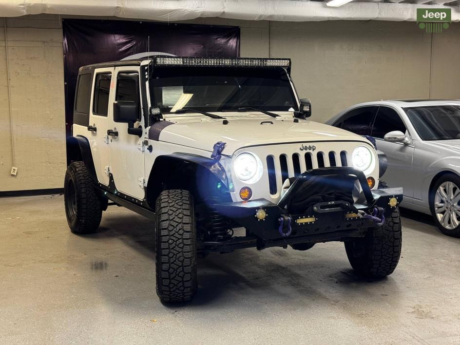 used 2014 Jeep Wrangler Unlimited car, priced at $13,850