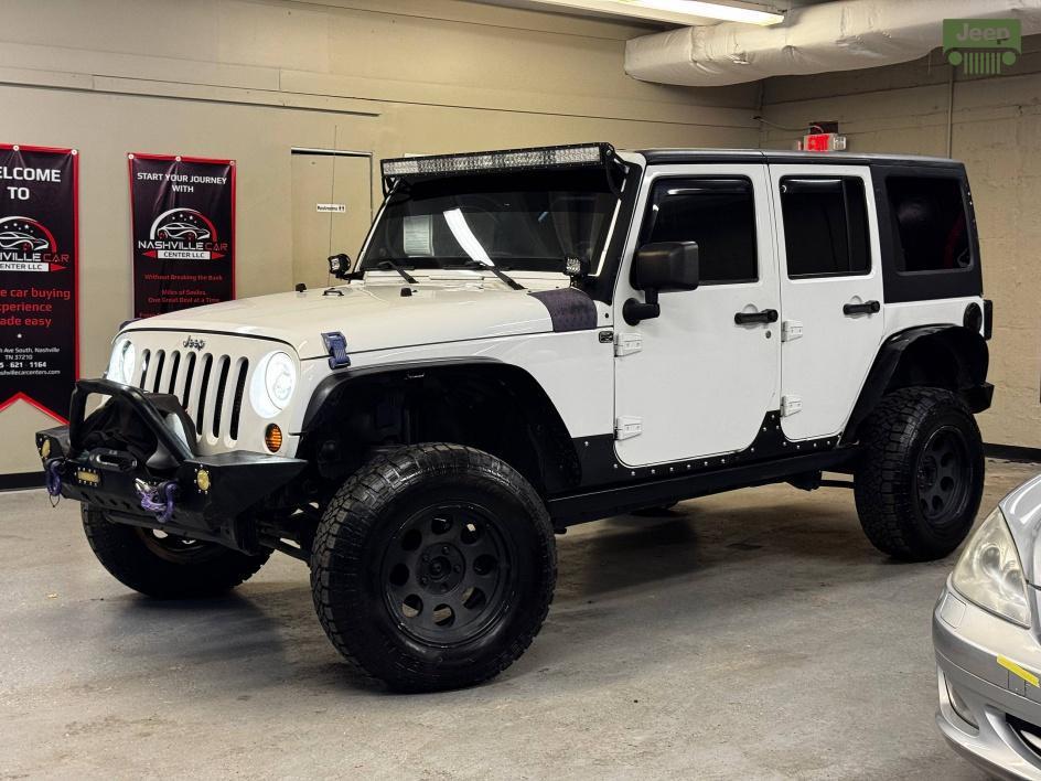 used 2014 Jeep Wrangler Unlimited car, priced at $13,850