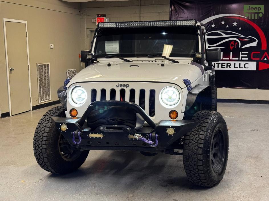 used 2014 Jeep Wrangler Unlimited car, priced at $13,850
