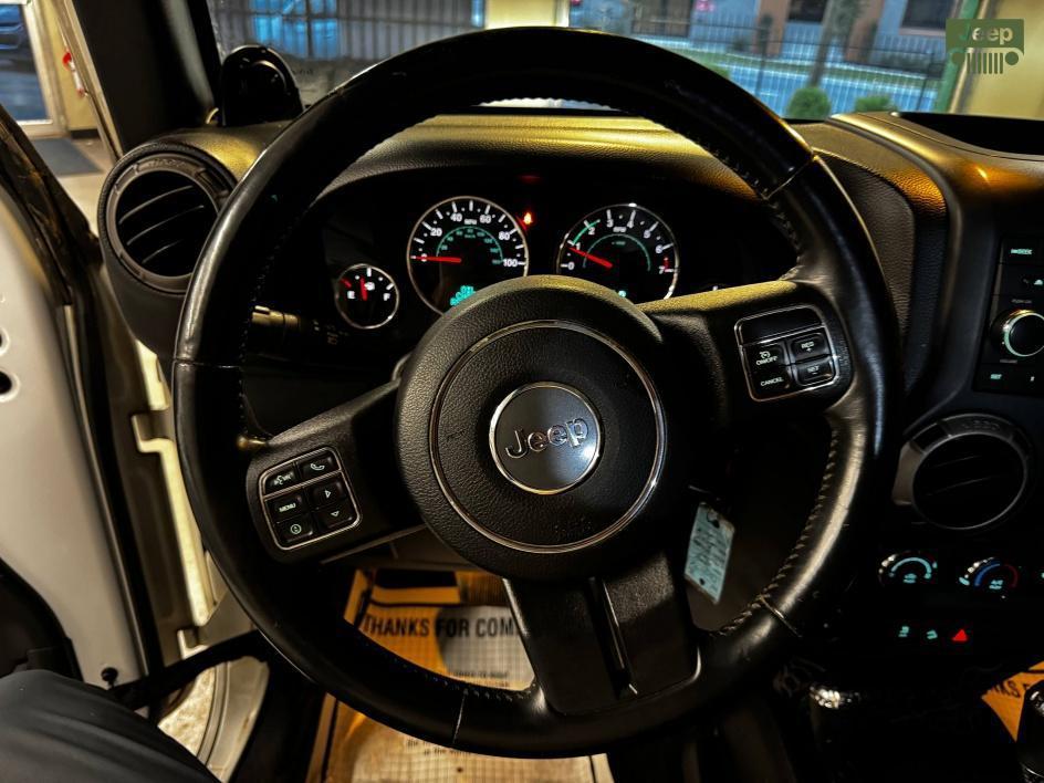 used 2014 Jeep Wrangler Unlimited car, priced at $13,850