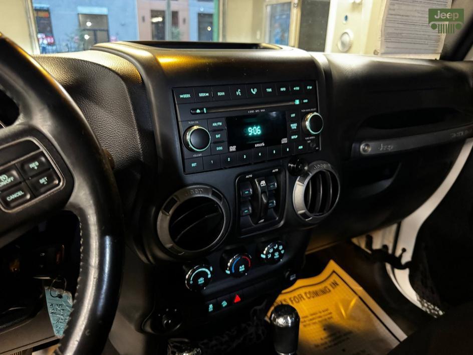 used 2014 Jeep Wrangler Unlimited car, priced at $13,850