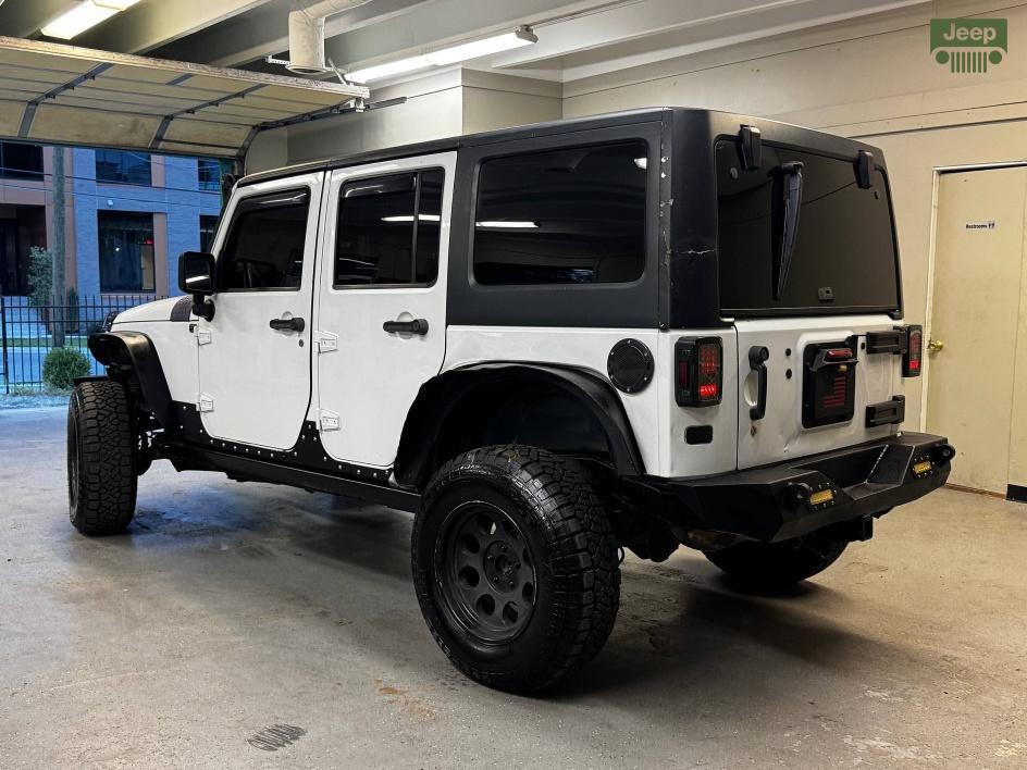 used 2014 Jeep Wrangler Unlimited car, priced at $13,850