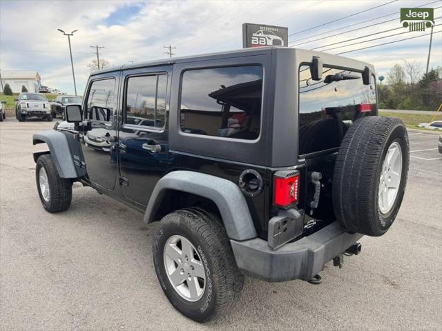 used 2014 Jeep Wrangler Unlimited car, priced at $13,999