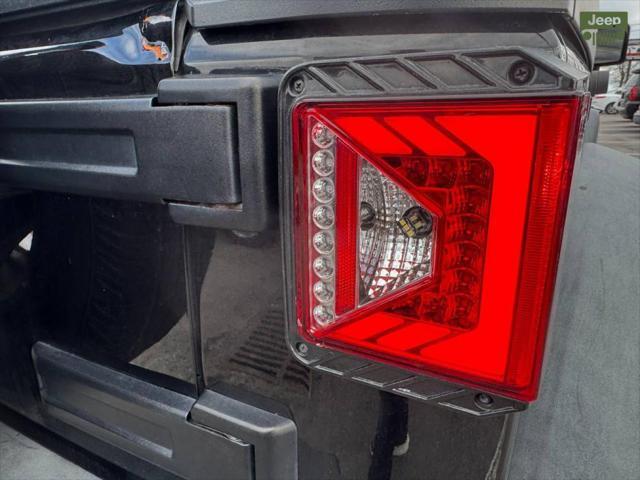 used 2014 Jeep Wrangler Unlimited car, priced at $13,999