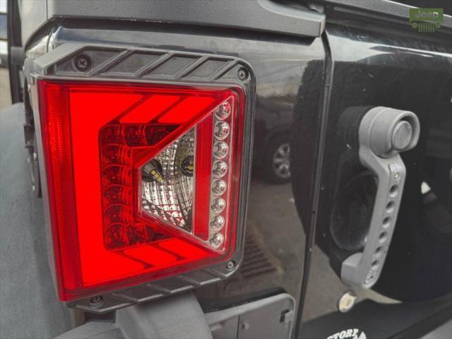 used 2014 Jeep Wrangler Unlimited car, priced at $13,999
