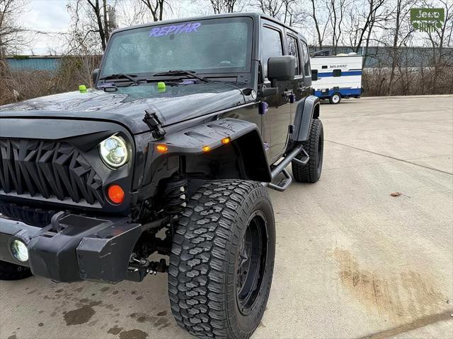 used 2012 Jeep Wrangler Unlimited car, priced at $12,999