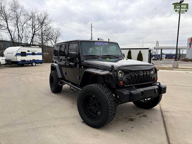 used 2012 Jeep Wrangler Unlimited car, priced at $12,999