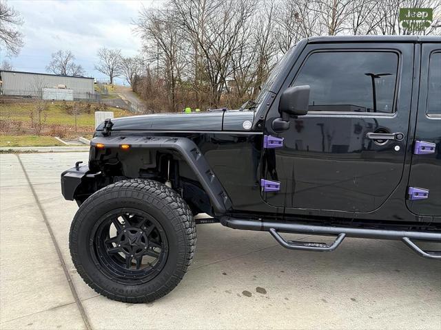 used 2012 Jeep Wrangler Unlimited car, priced at $12,999