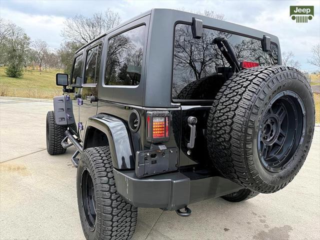 used 2012 Jeep Wrangler Unlimited car, priced at $12,999