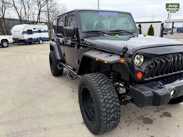 used 2012 Jeep Wrangler Unlimited car, priced at $12,999