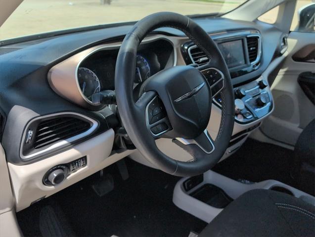 used 2023 Chrysler Voyager car, priced at $21,994